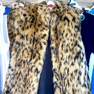 Avenue faux fur vests. Two sizes. One is a 14/16 and the other is a 16/18